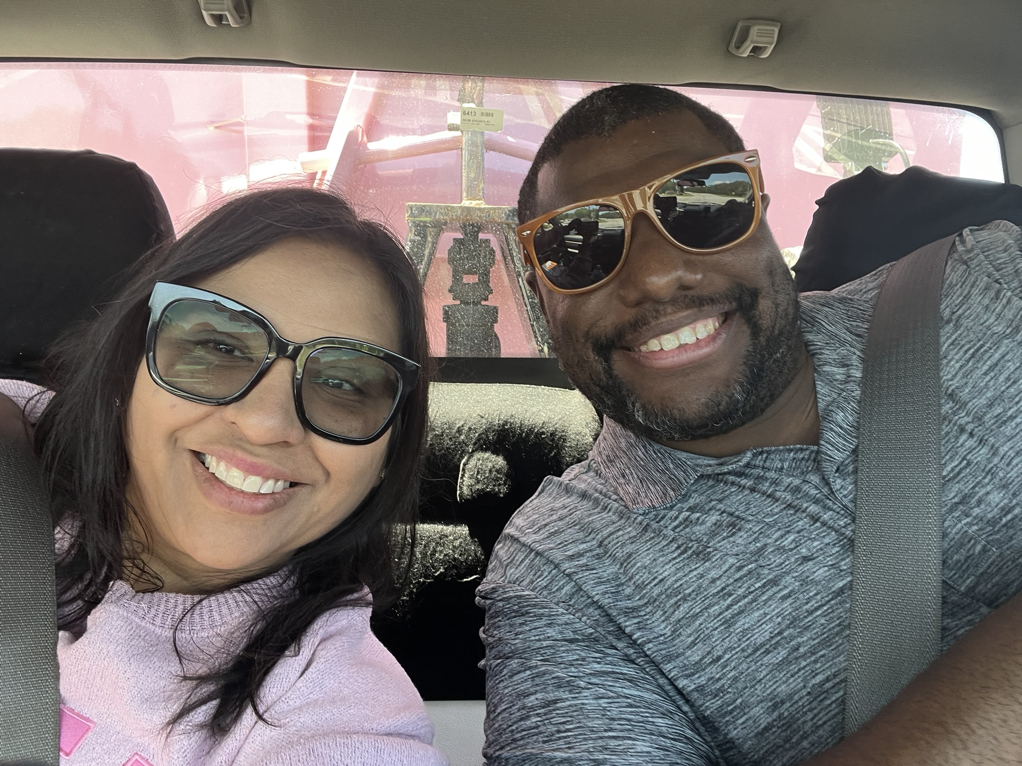 Marcus and Ivy Griffin with the Little Junkers pink dumpster truck